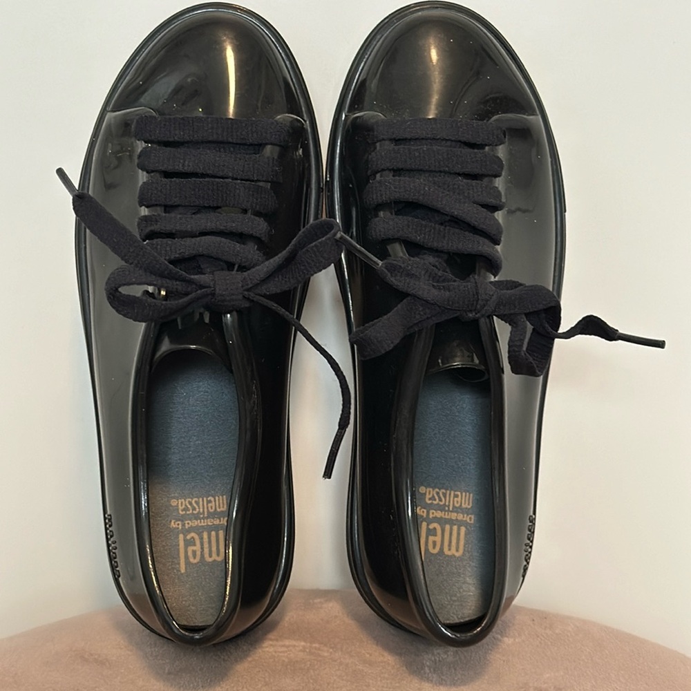 Super cool Melissa black closed toe shoes with laces! Size 1.